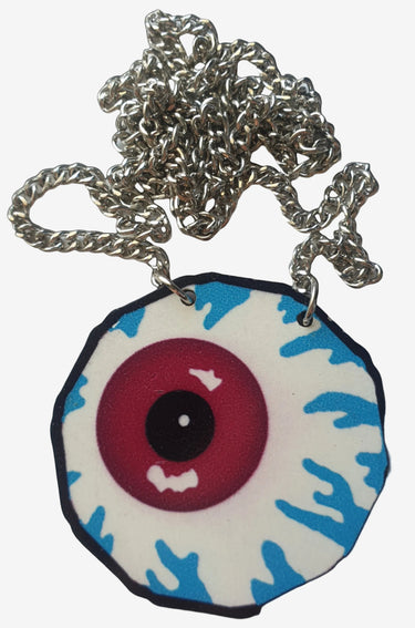 A silvertone metal alloy necklace with a wooden eyeball pendant featuring a red and blue color scheme.