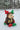 Plush reindeer toy in a snowy forest setting