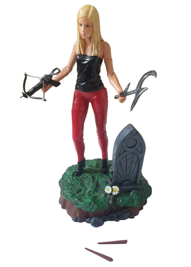 Buffy Summers action figure from Buffy the Vampire Slayer, sold out of original packaging, showing the exact figure and accessories included
