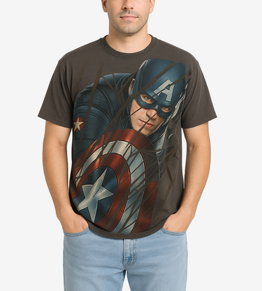 Man wearing a t-shirt with a superhero design on a plain background