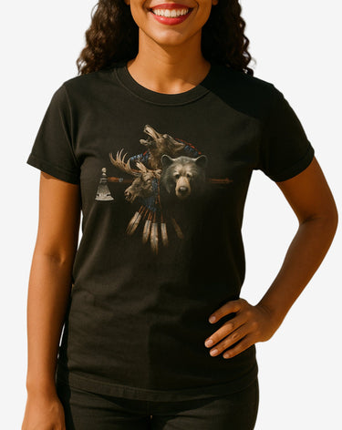 Woman wearing a black t-shirt with a graphic design of wolves and a bear on a white background