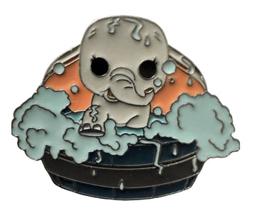 Enamel pin with Dumbo the elephant on a white background