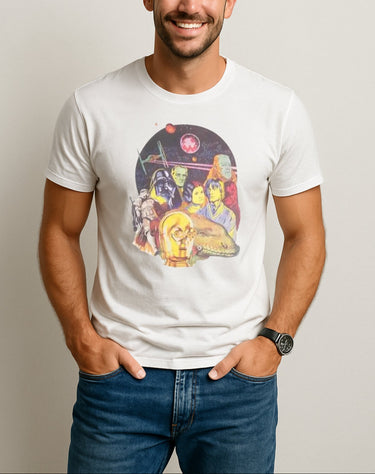 Man wearing a white t-shirt with a colorful graphic design on a plain background
