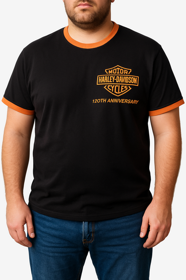Person wearing a black t-shirt with orange accents and a Harley-Davidson logo.