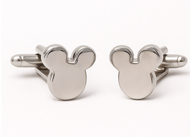 Metallic Mickey Mouse head-shaped cufflinks on a white background
