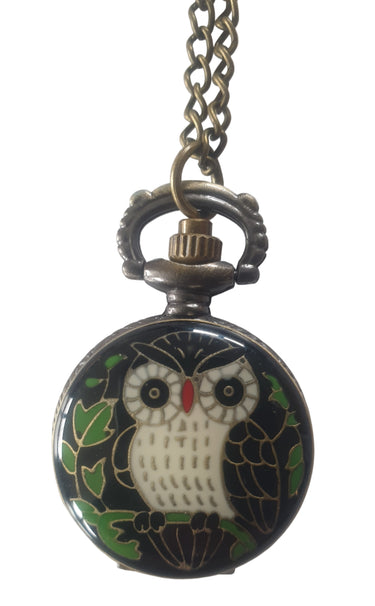 Decorative pocket watch with owl design on a white background