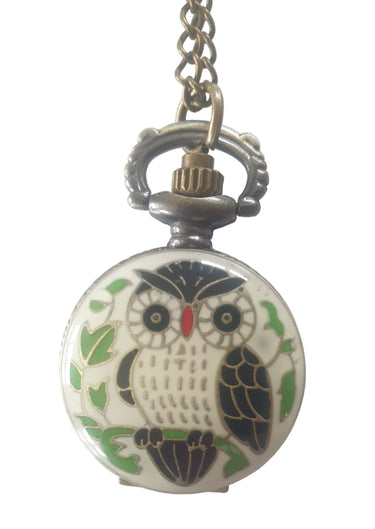 Decorative pocket watch with owl design on a white background
