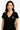Woman wearing a black V-neck t-shirt with a small graphic on a beige background