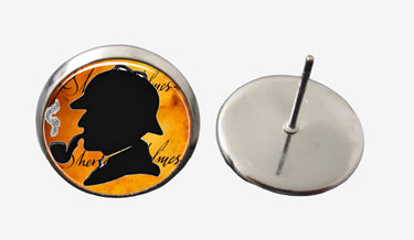 Earring with silhouette of a man smoking a pipe on an orange background