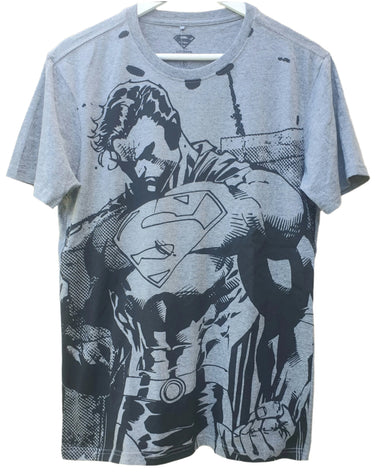 A gray t-shirt with a printed design of the superhero Superman, showing him in a ripped and muscular pose.