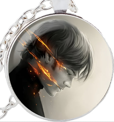 Circular pendant with an illustration of a person with flames, on a white background