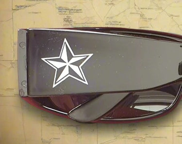 A pair of sunglasses with a Texas star design on the arms, one arm black and the other red.