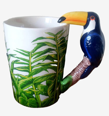 Mug with toucan bird handle and leaf design. Planet Retro NZ