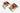 Gold tone earrings with red gemstones. Planet Retro NZ
