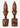 Two carved wooden bust sculptures with tall headdresses and stylized faces, shown side by side on a light gray background.