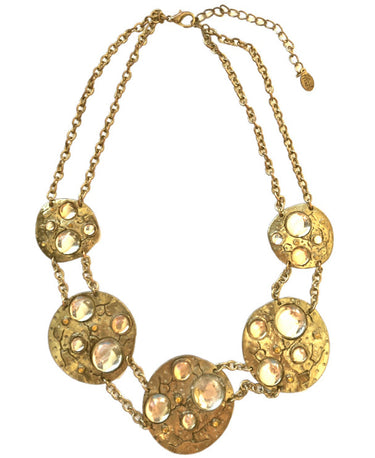 Bijoux Terner gold-tone double-chain statement necklace with textured discs and champagne glass stones.