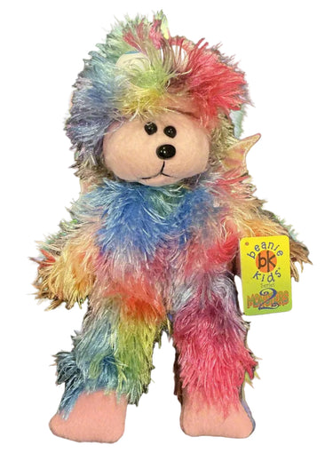Colorful stuffed monkey toy with a tag on a white background
