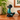 Vintage Blue Mountain Pottery green duckling figurine, 14cm tall, displayed on a wooden cabinet against a cream wall