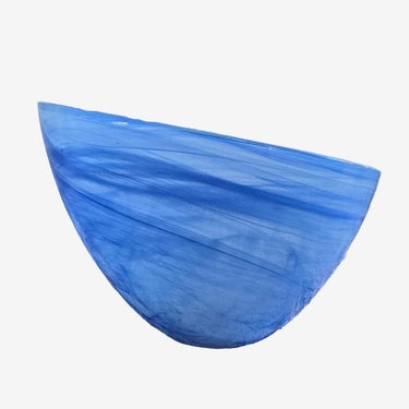 Blue swirling glass bowl with dramatic sloping rim, front view