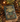 Book titled 'The Steampunk User's Manual' surrounded by vintage items on a wooden surface.