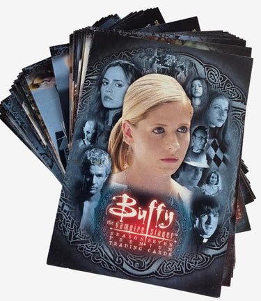 A stack of Buffy the Vampire Slayer
Season 7 trading cards fanned out on a light gray surface. The front card features a portrait of Buffy with the show's title and character names printed below.