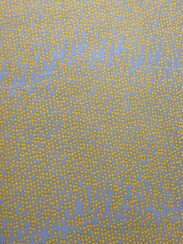 Caravan yellow dot cotton fabric close-up