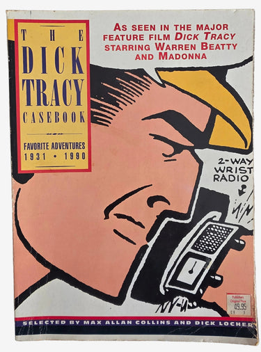 Vintage comic book cover for 'The Dick Tracy Casebook' laid flat on a white textured fabric background. The cover features Dick Tracy's illustrated face holding a radio receiver, with a yellow title box and red and black text.