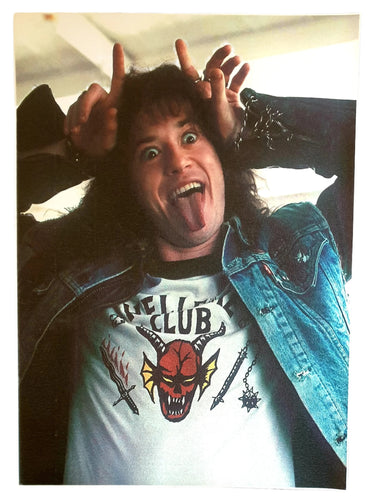 Eddie Hellfire Club Stranger Things A3 art print featuring Eddie Munson pulling a playful face while wearing a Hellfire Club shirt.