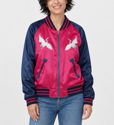 Enterprise Japan unisex reversible sukajan jacket with magenta crane embroidery and teal US Navy Seabees design, shown on model for Planet Retro.