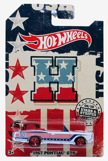 A packaged Hot Wheels toy car model depicting a 1967 Pontiac GTO with red and dark blue stars and stripes graphics, on a blister card.