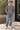 Huffer grey lambswool blend men's knit size 2XL with olive shoulder panels styled outdoors with blue jeans