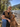 JC Collection brown leather utility vest XL styled with jeans and aviator sunglasses beside a dog at a river