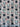 Overall view of KOKKA cat faces and bows on pale pink pinstripe cotton fabric