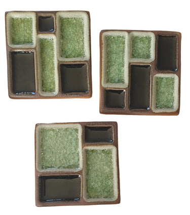 MIRO New Zealand geometric ceramic wall tile featuring textured green and black glazed sections.