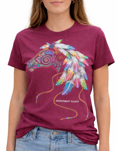 Monument Valley horse graphic women’s T-shirt with colourful feather design on burgundy cotton