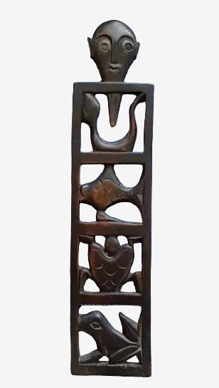 Hand carved Pacific Island wooden wall panel with tribal figures and animal motifs vertical design