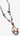 Beaded necklace with multicolored beads on a light background
