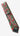Christmas-themed tie with red and green pattern on a white fabric background