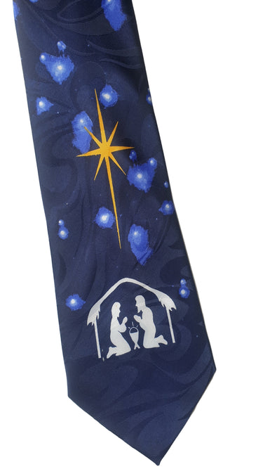 Navy blue tie with nativity scene and star design on a white background
