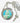 Necklace with a round pendant featuring a robot design on a grey surface.
