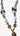 Colorful beaded necklace on a light background