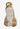 Small figurine of a person in a robe on a textured surface