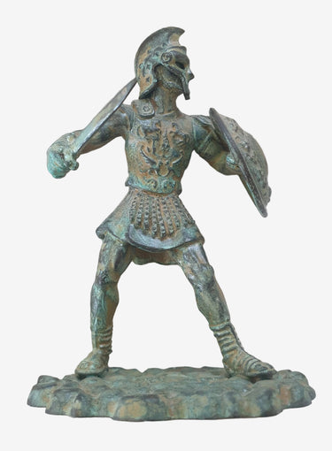 Small Italian cast bronze gladiator figurine with aged patina and removable helmet. A compact Roman-inspired sculptural decor piece from Planet Retro.
