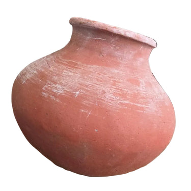 Rustic rounded terracotta vessel with weathered earthy surface – front view