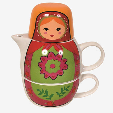 Teapot with matryoshka design on a white background