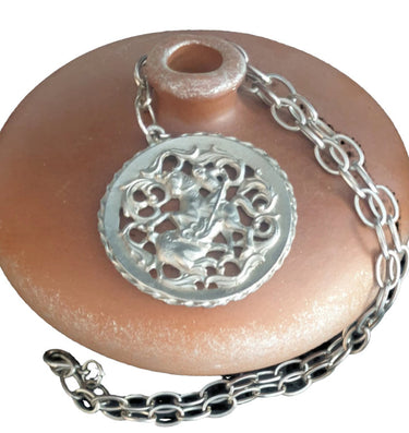 Vintage Saint George dragon slayer medallion necklace with large silver tone pendant and chain