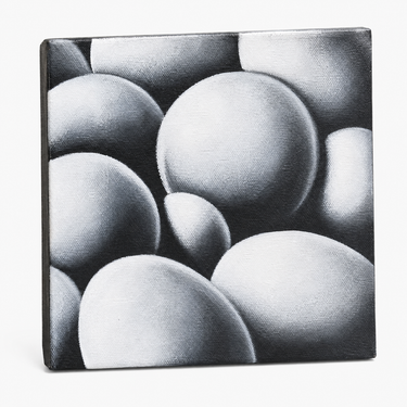 A square canvas wall art print featuring a black and white 3D-style drawing of overlapping spheres, shown standing against a plain white background.