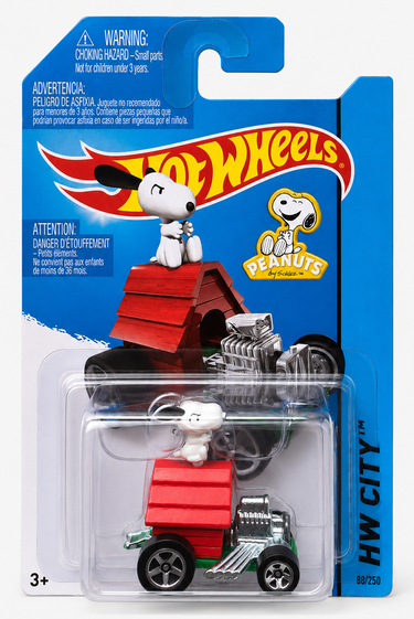 Carded 2013 Hot Wheels Snoopy Peanuts HW City toy car with red doghouse design and Snoopy figure, sealed in original packaging.