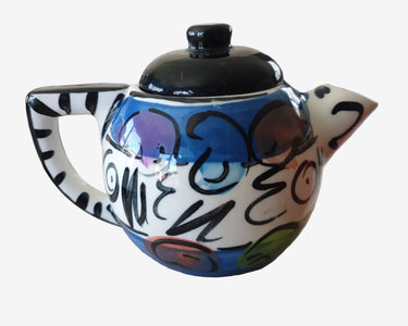 Hand-painted Stage Artware teapot from New Zealand featuring bold graphic decoration and striped handle, circa 1980s studio pottery.