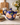 Sue Newitt Nelson studio pottery teapot c.1987–1994 with cobalt glaze and hand painted pink floral design, impressed early maker’s mark to base.